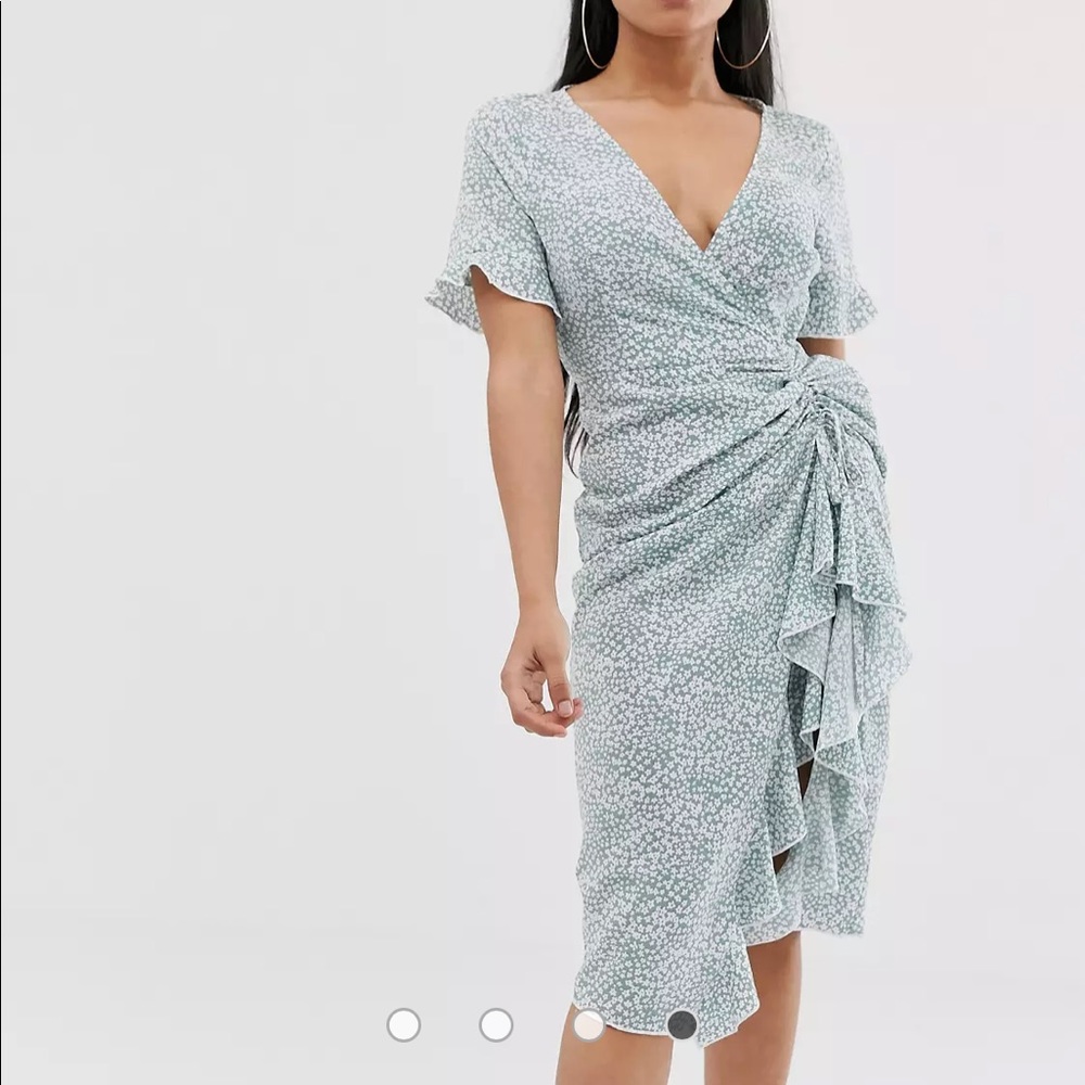 NWOT midi dress with ruched thigh split in floral print